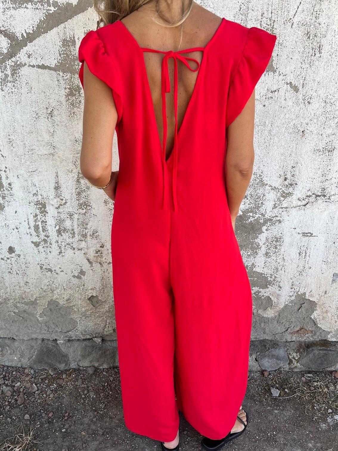 Leopard Print V-Neck Jumpsuit With Front Pockets - Image 10